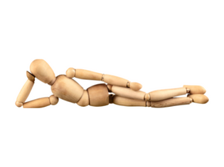  Wood mannequin laying down